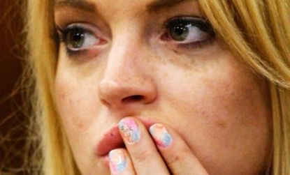 Some say a message inscribed on Lohan's fingernail could land her even more time behind bars.