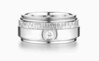 silver diamond ring by Piaget