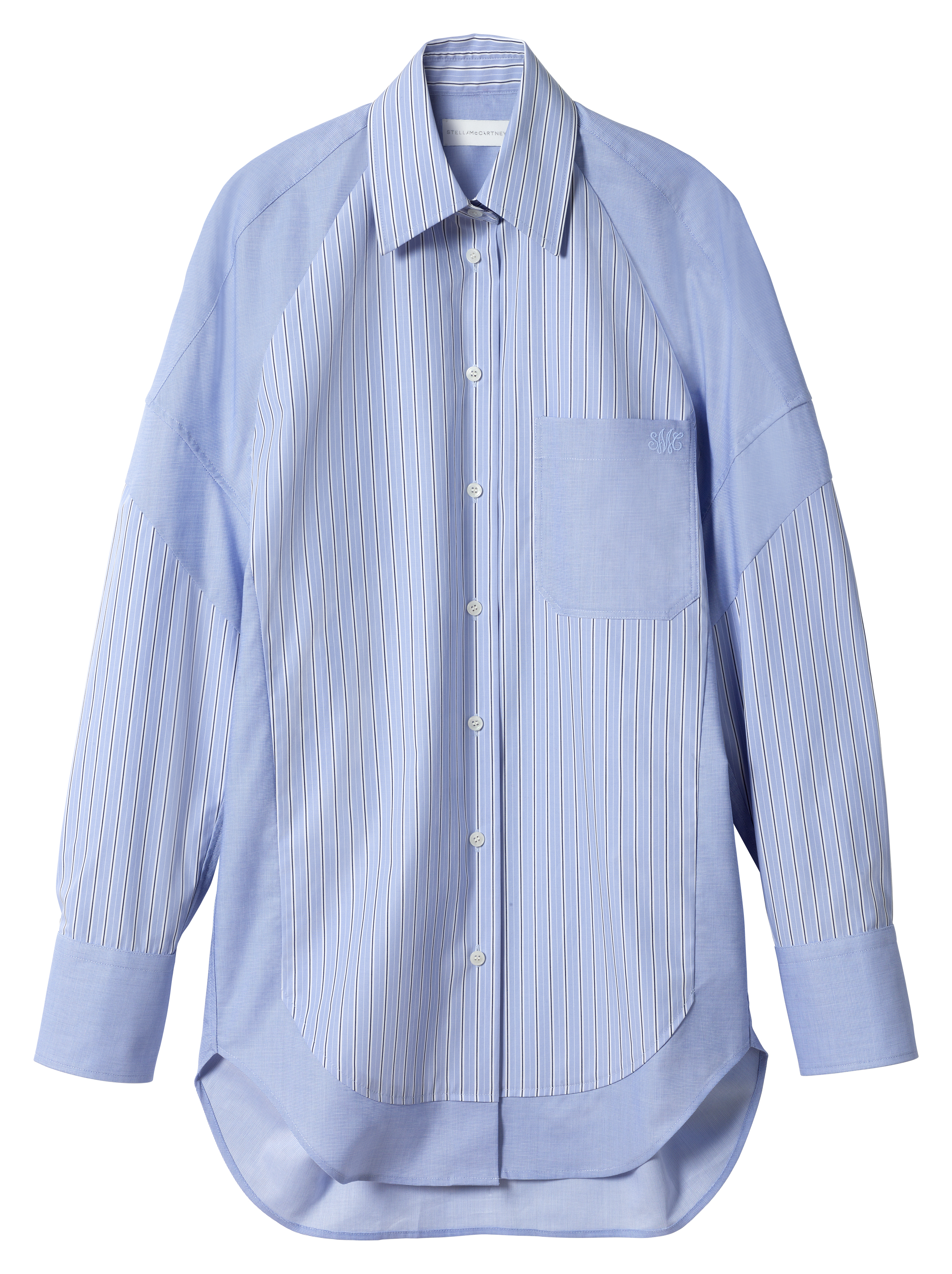 clothes from the H&M x Stella McCartney collaboration on a plain backdrop