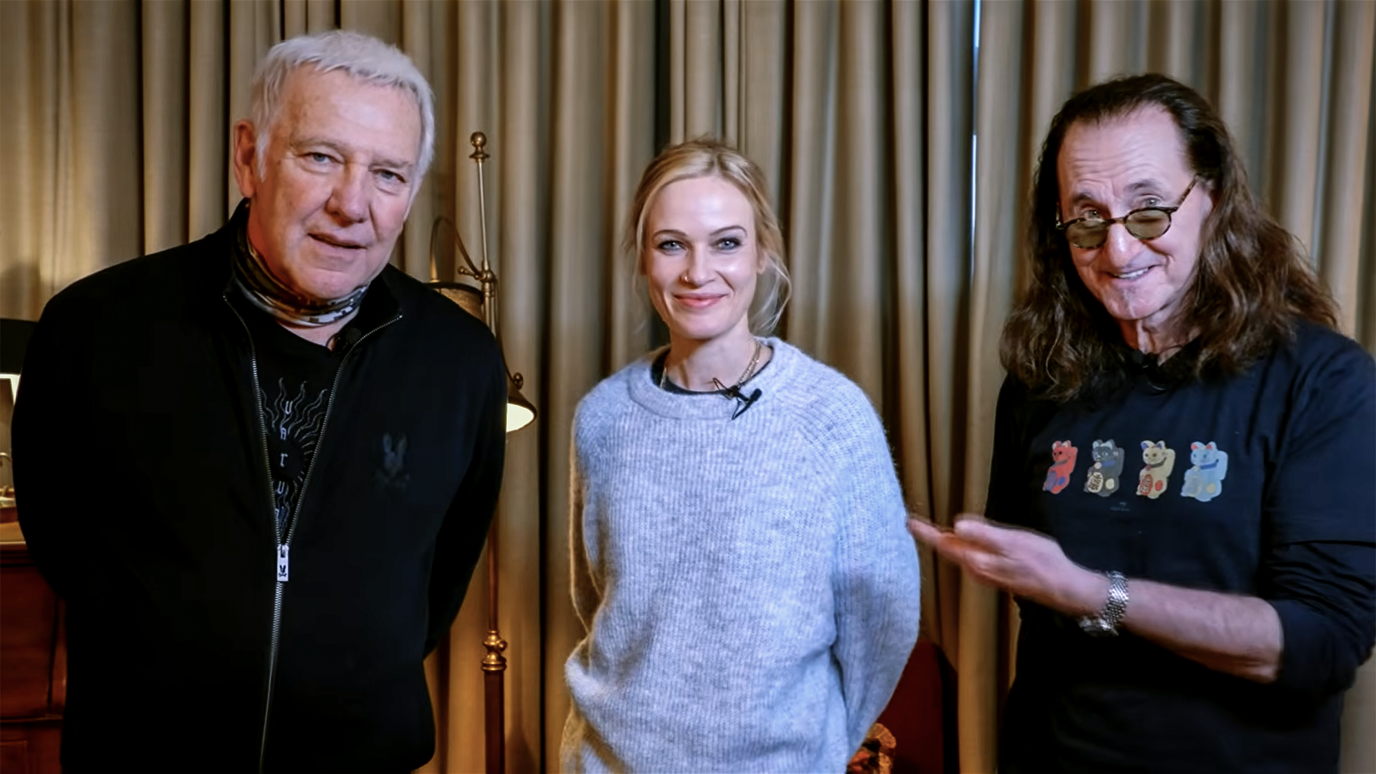 Rush in 2026. From left: Alex Lifeson, Anika Nilles and Geddy Lee