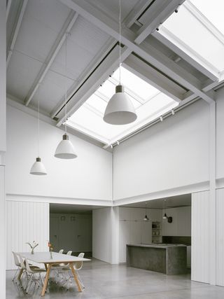 Interior with high ceilings and skylight at Studio Richter Mahr