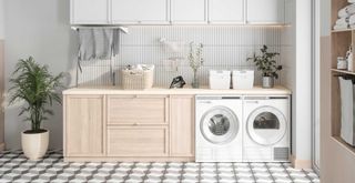 White clean and tidy laundry room with fold away drying rack to demonstrate laundry organization ideas
