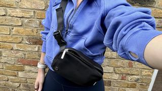 a photo of fitness editor wearing the lululemon everywhere belt bag