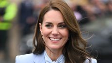 Catherine, Princess of Wales wearing pastel blue during a visit to Carrickfergus on October 06, 2022