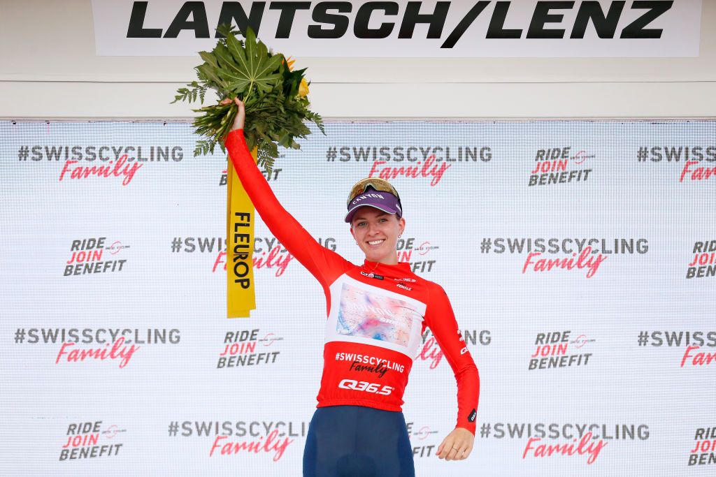 LENZERHEIDE SWITZERLAND JUNE 21 Pauliena Rooijakkers of The Netherlands and Team CanyonSRAM Racing celebrates winning the red mountain jersey on the podium ceremony after the 2nd Tour de Suisse Women 2022 Stage 4 a 985km stage from Chur to Lantsch Lenz tourdesuisse2022 on June 21 2022 in Lenzerheide Switzerland Photo by Heinz ZwickyGetty Images