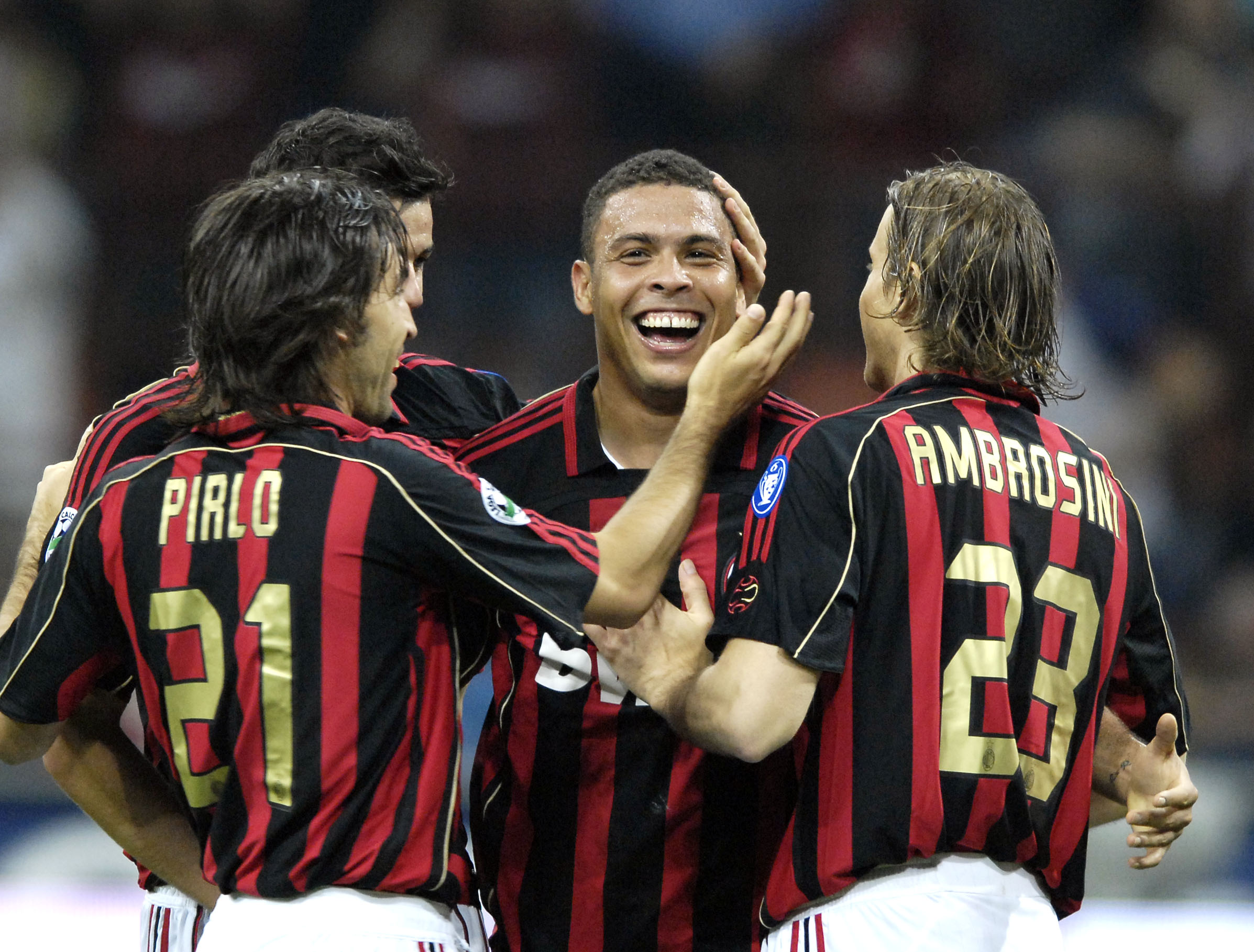 Ronaldo of AC Milan (C) celebrates during the Serie A 2006/2007 33th round match between Milan and Cagliari played at the "Giuseppe Meazza" in Milan.