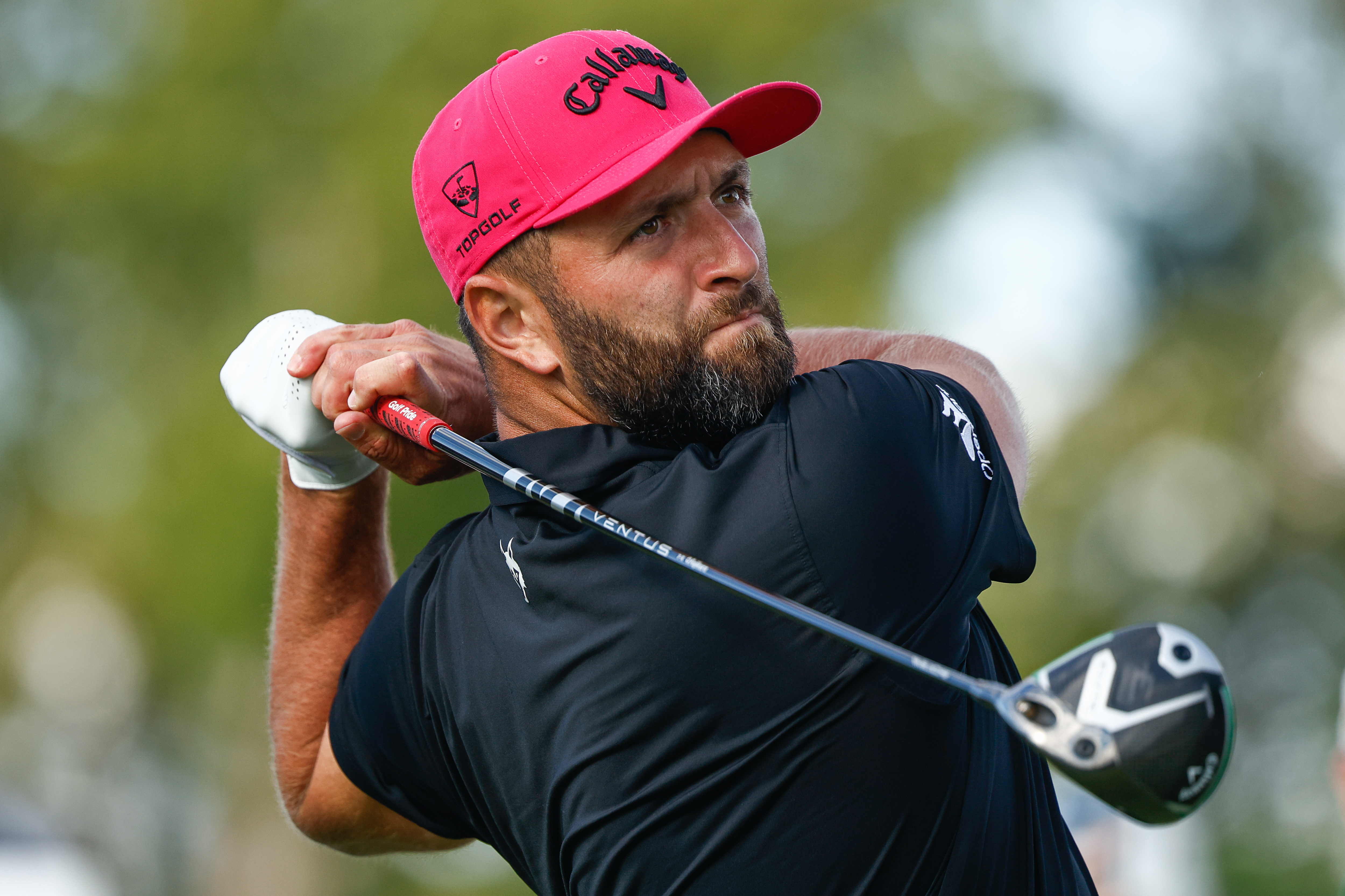 Jon Rahm hits a driver off the tee