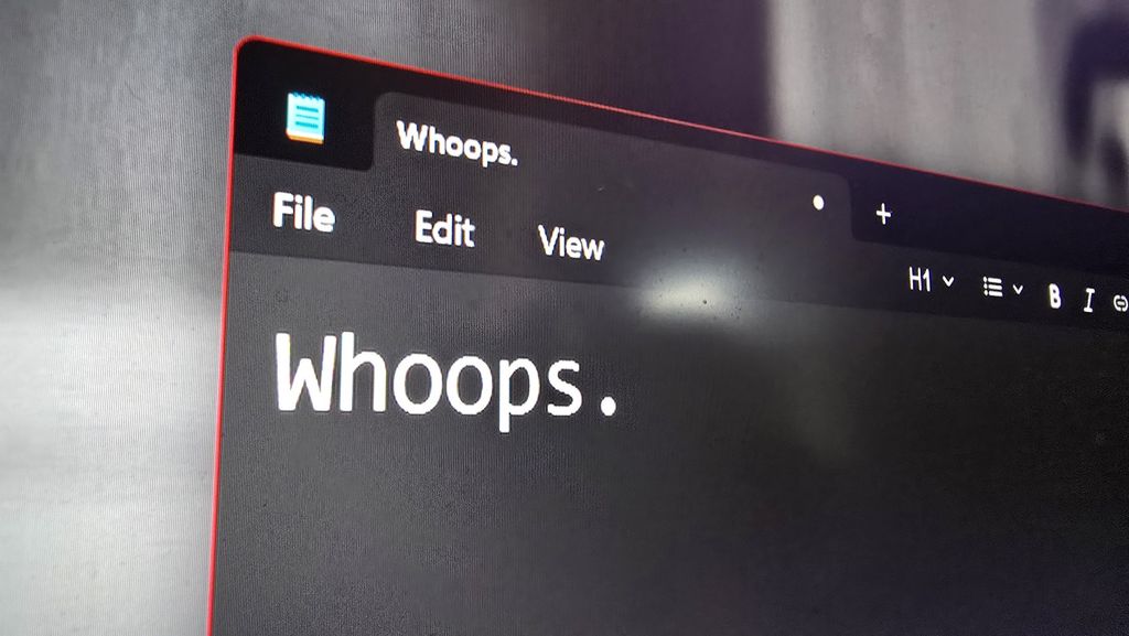 Notepad with "Whoops" on the text editor.