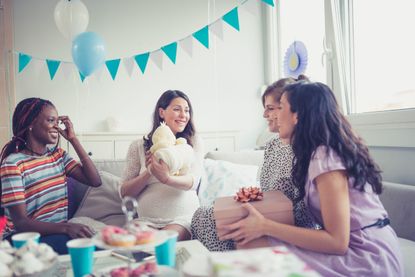 women at a baby shower - what to write in a baby shower card