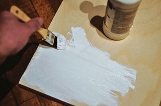 A base layer of primer stops wood absorbing paint