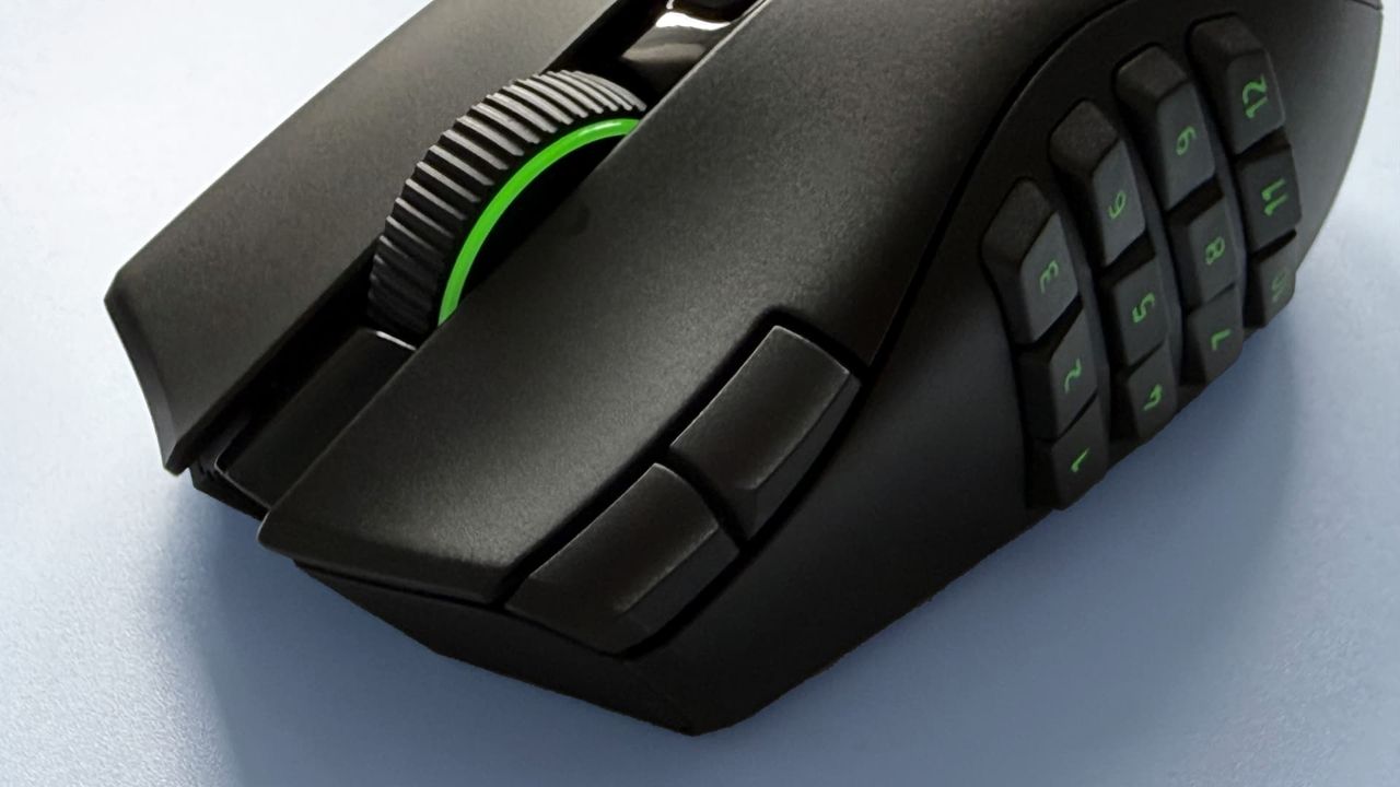 The Razer Naga V3 Pro mouse against a blue background.