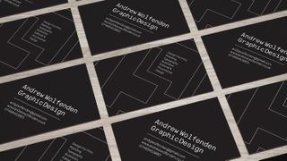 Wolfenden makes white-on-black type work well in these cleverly designed cards