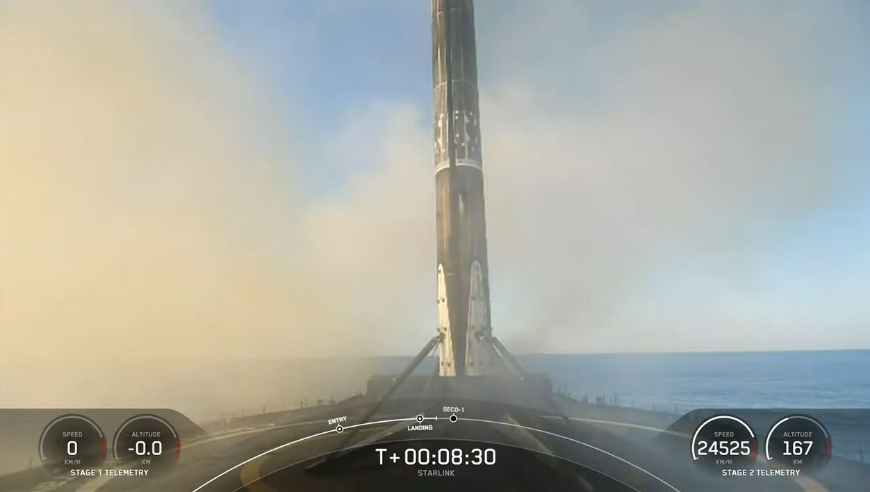 A SpaceX Falcon 9 rocket stands atop the droneship A Shortfall Of Gravitas after successfully launching 53 Starlink satellites into orbit on May 18, 2022.