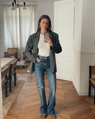 A woman in jeans.