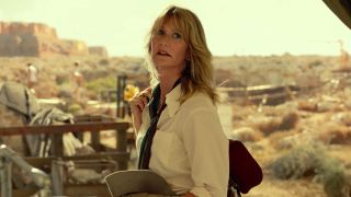 Laura Dern standing at a dig site in Jurassic World: Dominion