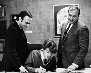 Signing with Roulette in 1966. L-r: Lennt Stogel (manager) Tommy and Morris Levy.