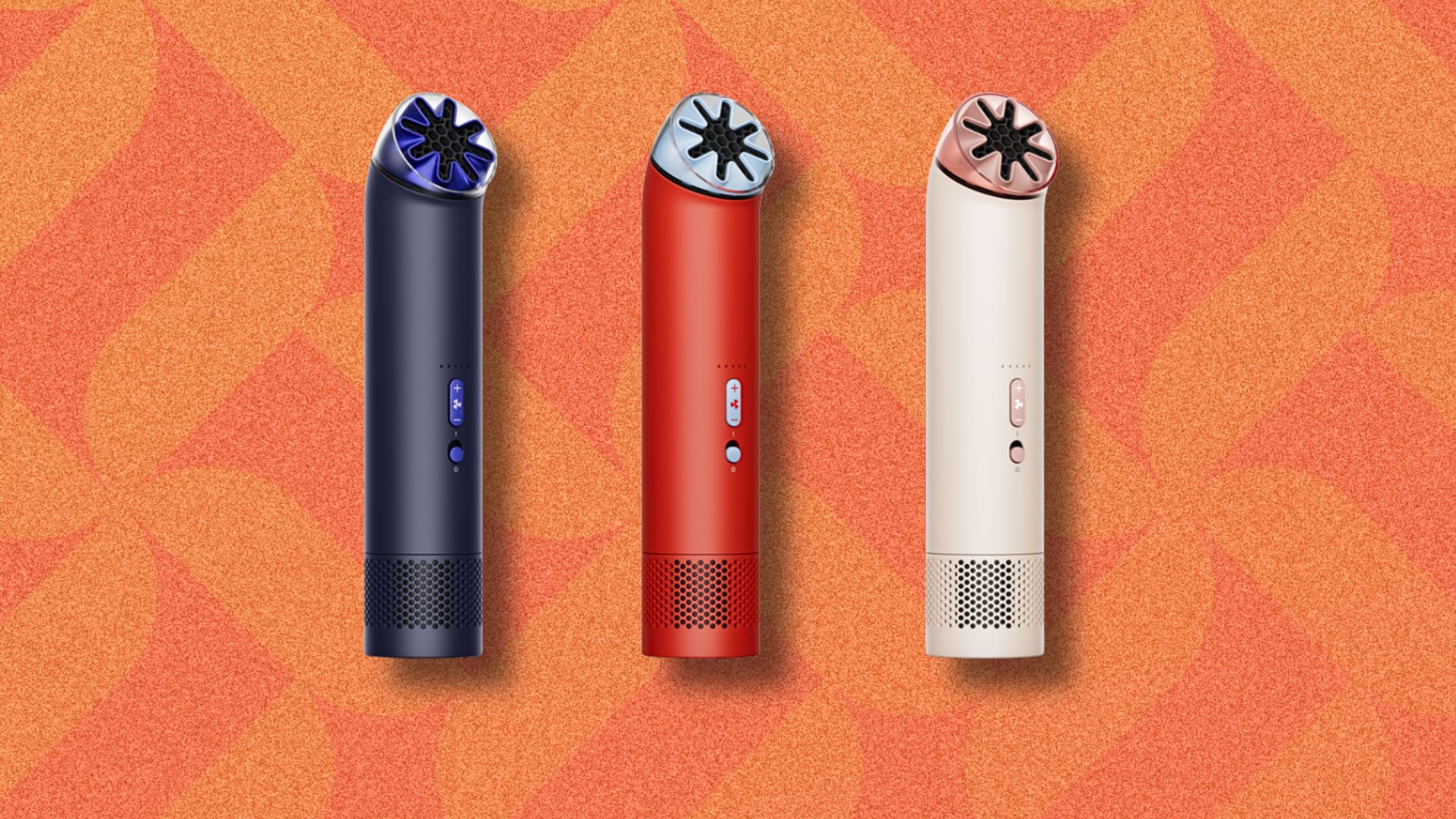 an image of three of the hand held portable Dyson fans, one in each colour way against an orange portable background