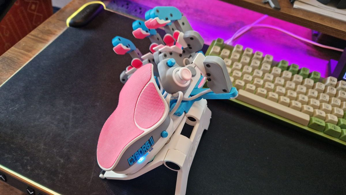 An Azeron Cyborg II propped up on its magnetic stand