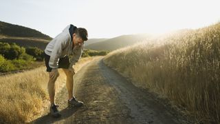 Male jogger resting