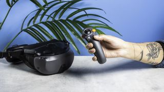 DJI Goggles N3 FPV headset in a dary gray colorway and a DJI RC Motion 3 controller