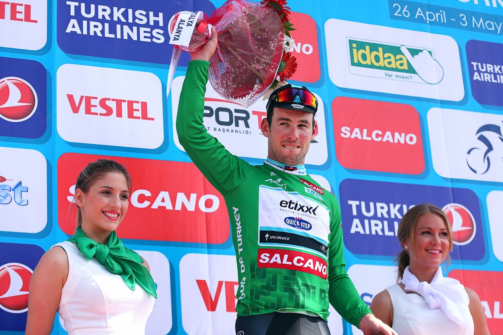 Cavendish in the green sprint points jersey.