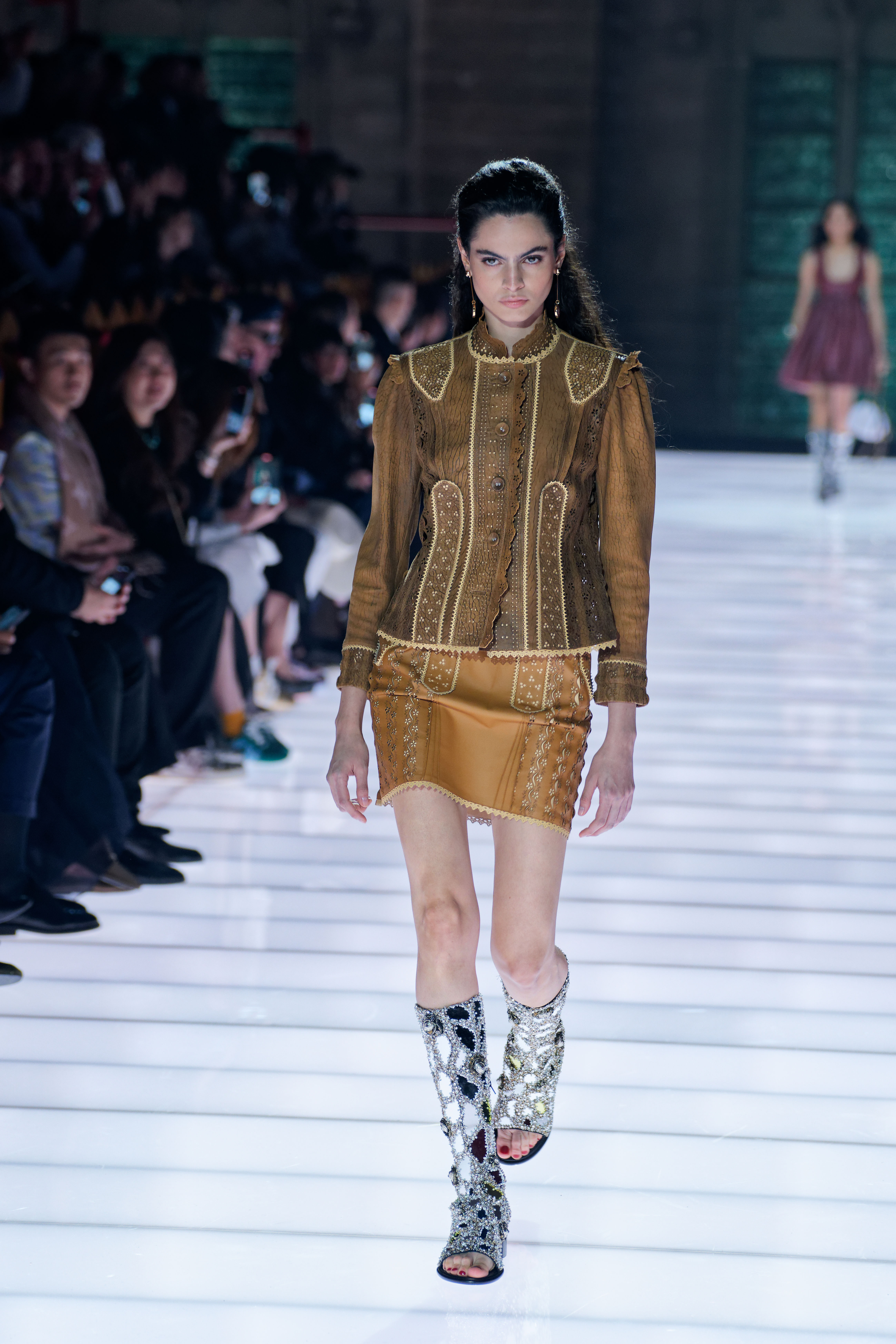 Sophie Turner's skirt set on the Louis Vuitton Cruise 2026 runway