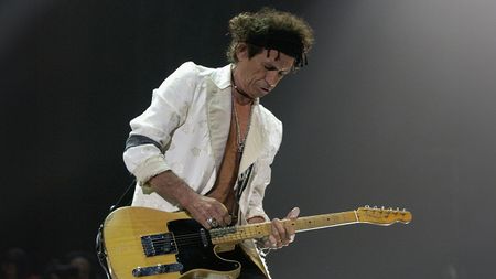  Rolling Stones' guitarist Keith Richards performs at the Rod Laver Arena February 25, 2003 in Melbourne, Australia. The Rolling Stones will play in three major Australian cities as part of their 40 Licks World Tour 2003