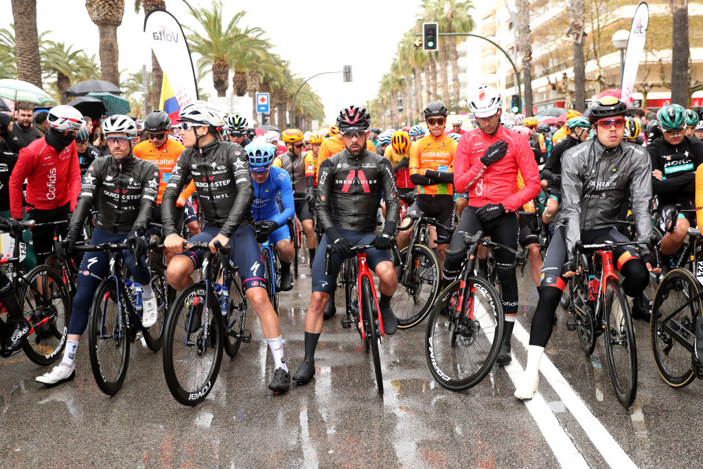 CAMBRILS SPAIN MARCH 26 LR Dries Devenyns of Belgium Louis Vervaeke of Belgium and Team QuickStep Alpha Vinyl Nicolas Jonathan Castroviejo of Spain and Team INEOS Grenadiers Jos Herrada Lopez of Spain and Team Cofidis and Phil Bauhaus of Germany and Team Bahrain Victorious Blue Points Jersey prior to the 101st Volta Ciclista a Catalunya 2022 Stage 6 a 1685km stage from Costa Daurada SalouCambrils to Costa Daurada SalouCambrils VoltaCatalunya101 WorldTour on March 26 2022 in Cambrils Spain Photo by Gonzalo Arroyo MorenoGetty Images
