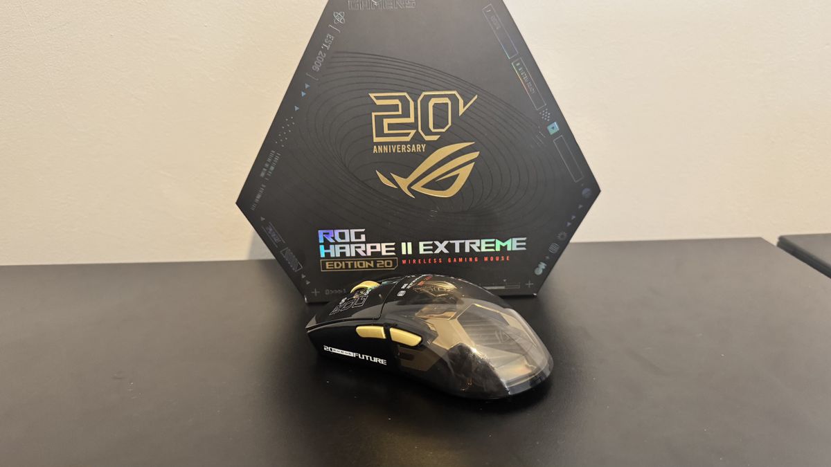 Asus ROG Harpe II Extreme Edition 20 on a black table, next to its box