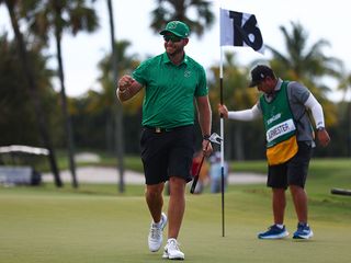 Dean Burmester on the green at LIV Golf Miami