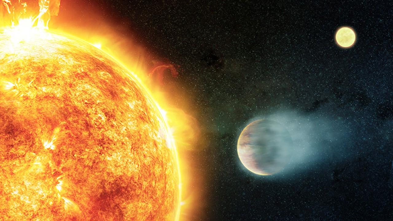 An artist's illustration shows a gas giant planet (lower right) closely orbiting its host star (left).