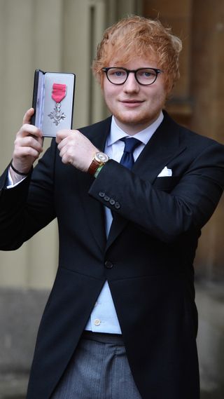 Ed Sheeran collecting his MBE
