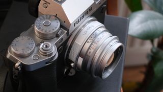 Thypoch Ksana 35mm lens mounted on a Fujifilm camera