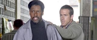 Denzel Washington and Ryan Reynolds in Safe House