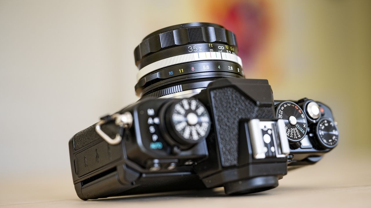 Voigtlander D 35mm f1.2 Nokton lens on a wooden table