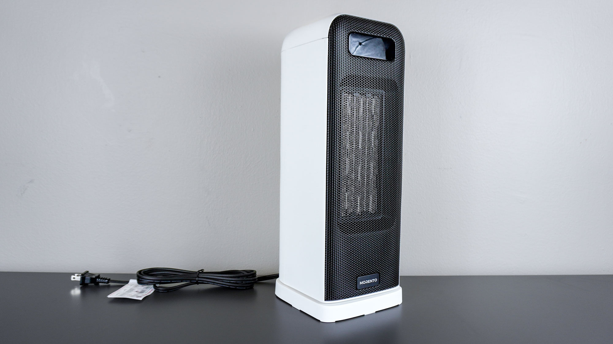 The Morento Smart Space Heater unboxed on a desk