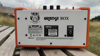 The rear of the Orange Box, showing the charging port