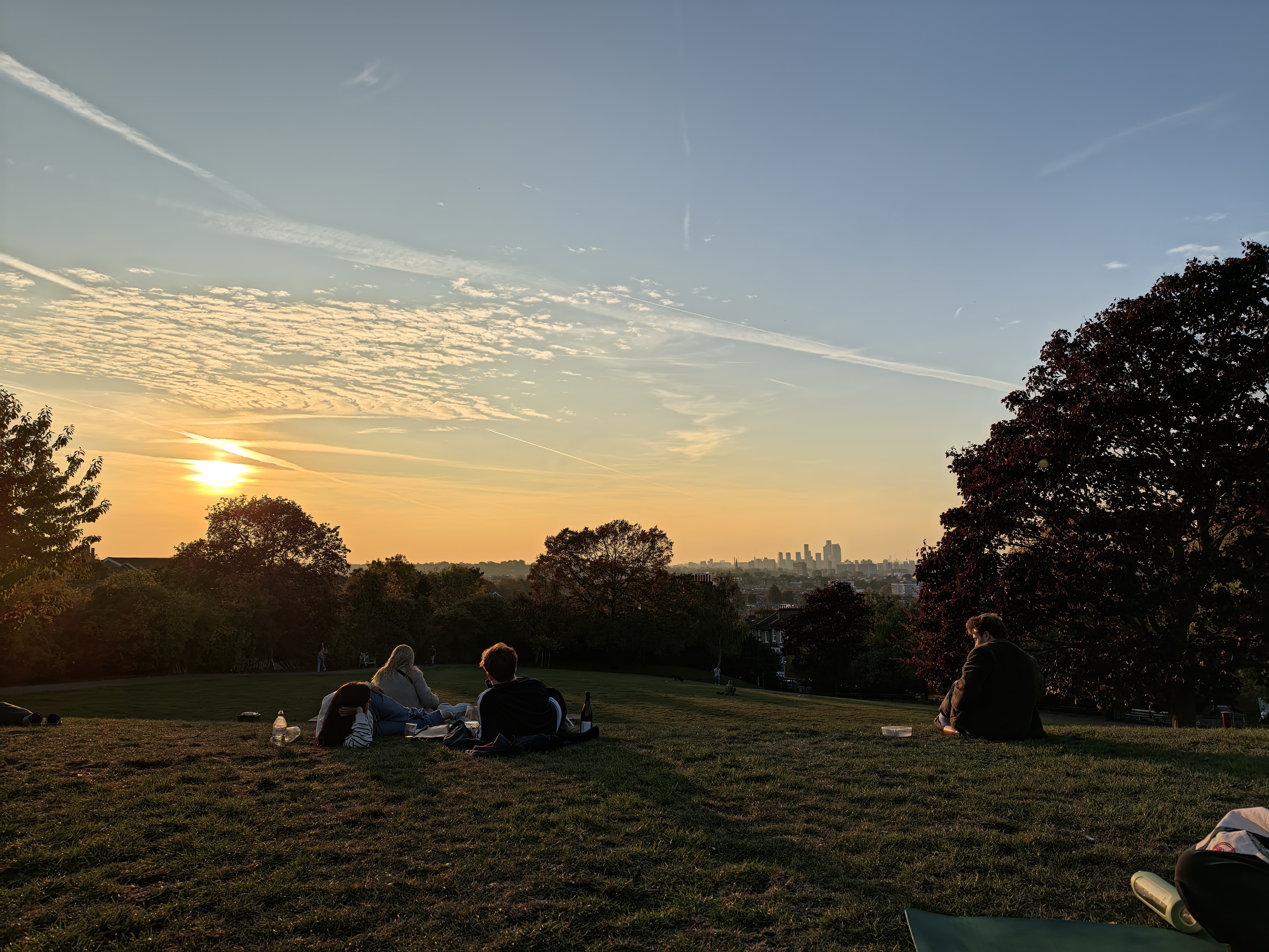 A view from a hill at sunset