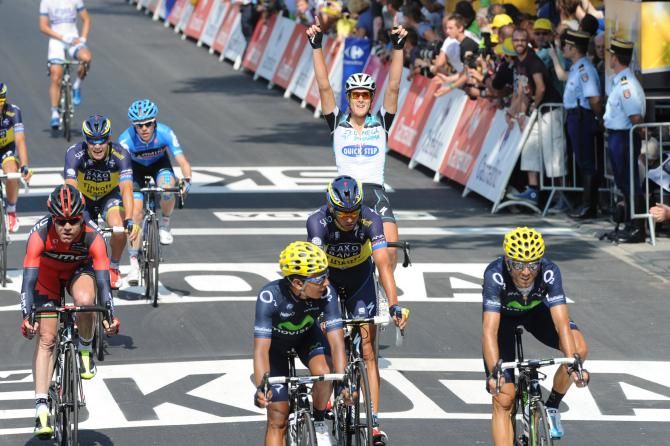 Matteo Trentin (Omega Pharma-Quickstep) celebrates although Cavendish was defeated on stage 12