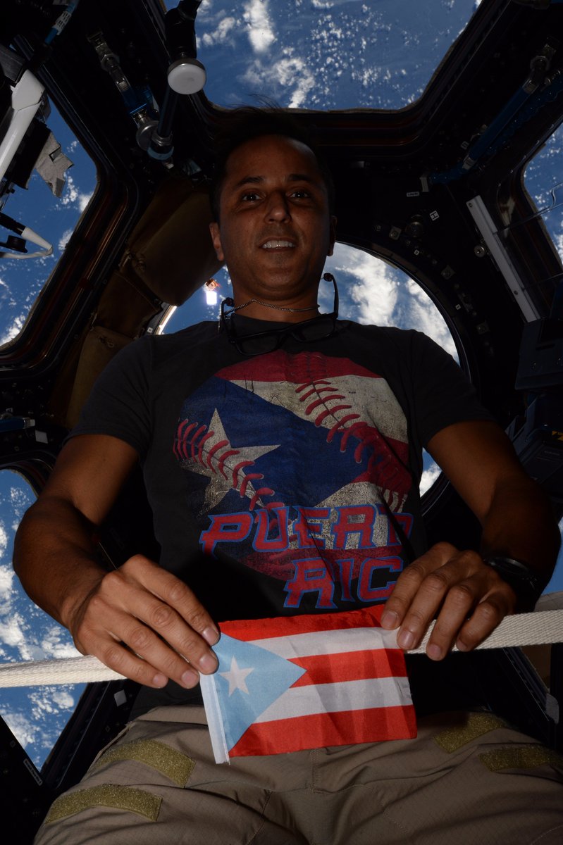 Joe Acaba with Puerto Rican flag