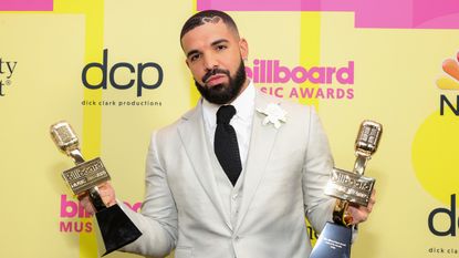  Drake, winner of the Artist of the Decade Award, poses backstage for the 2021 Billboard Music Awards