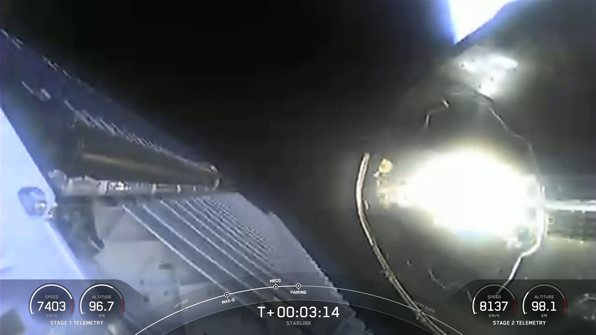 The payload fairing separates from the upper stage, revealing 60 Starlink satellites.