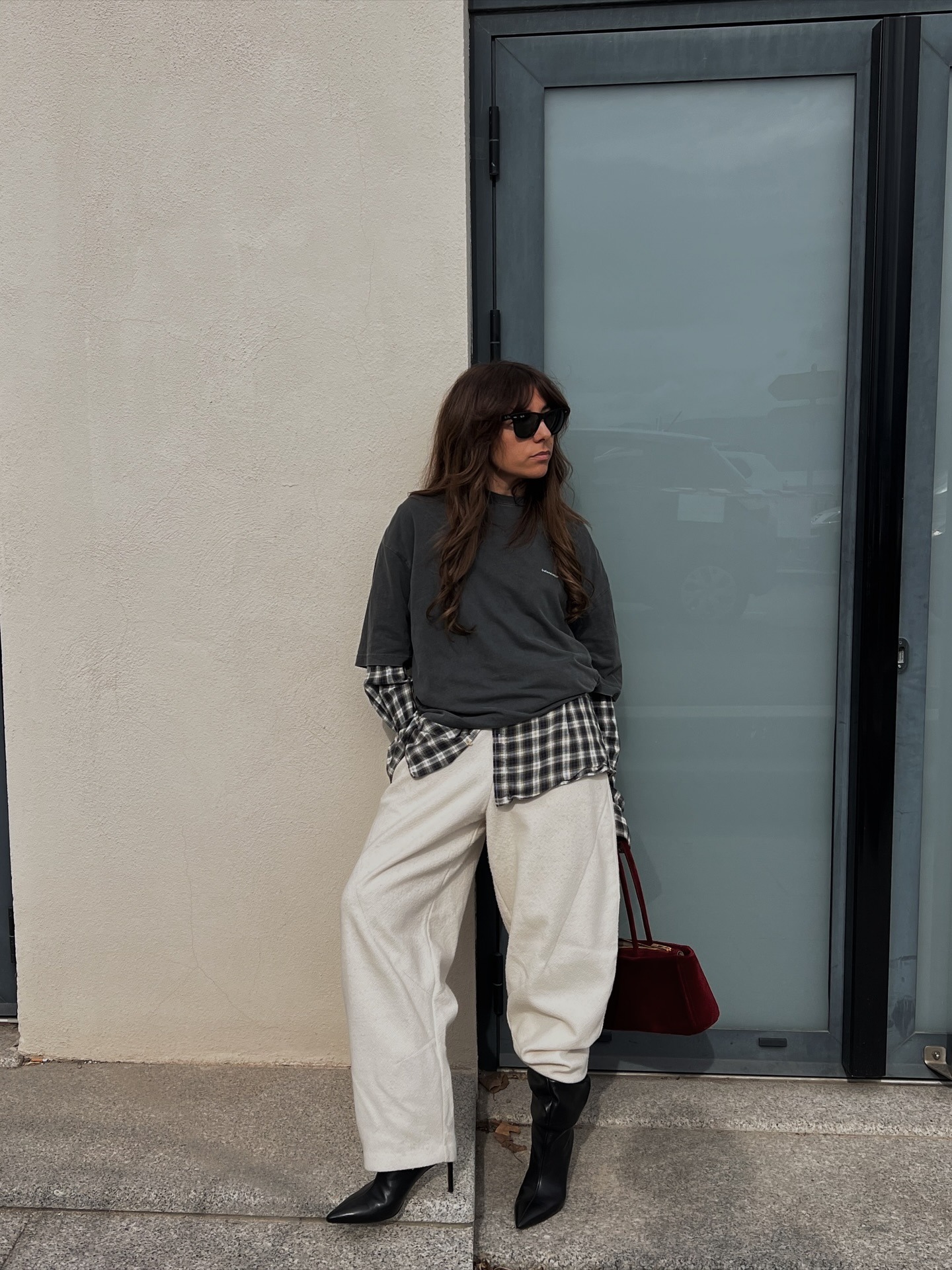 Influencer wearing knee high boots for winter.