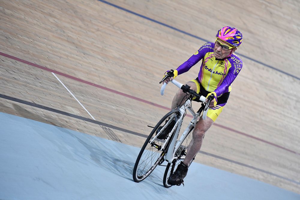 Robert Marchand rides in his attempt to set a one-hour track cycling World record in the over-105 age group