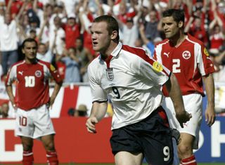 Wayne Rooney scores against Switzerland at Euro 2004 (PA)