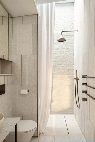 white bathroom in suburban House by SPPARC
