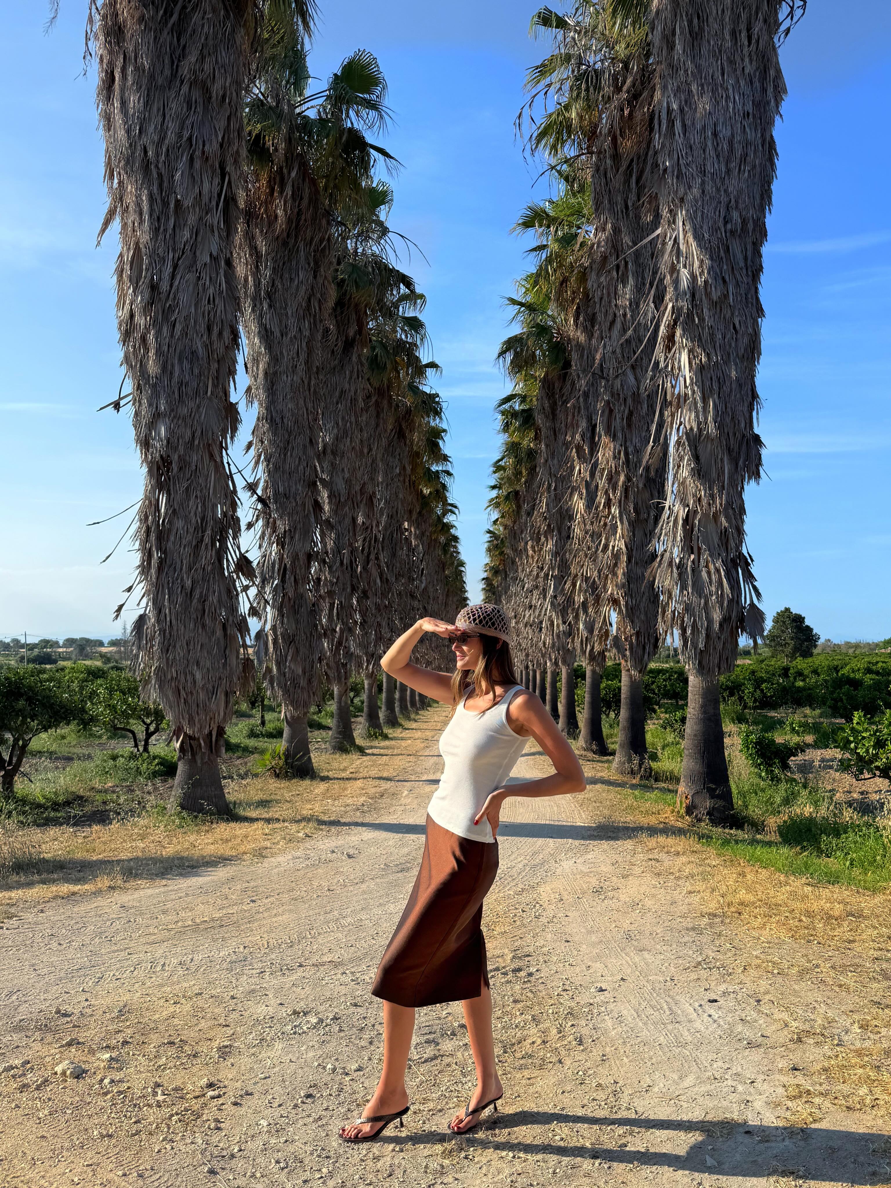 An image of @cocoschiffer wearing a crochet skull cap, one of the biggest hat trends of 2026.