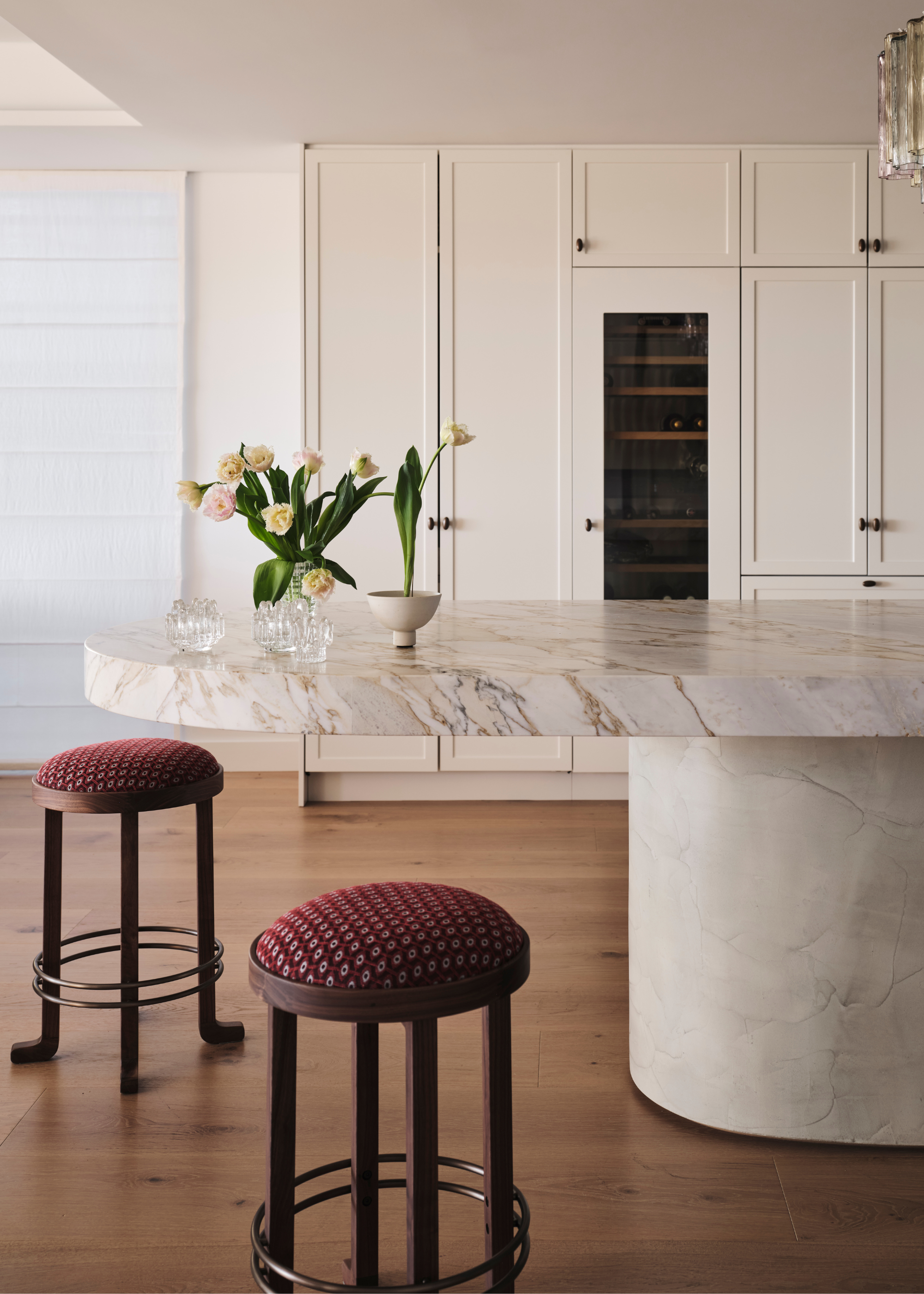large marble kitchen island with golden veining