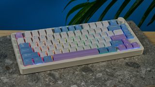 A pink, blue and white Gamakay TK75 Pro wireless mechanical keyboard with hot-swappable linear switches