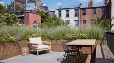 A small rooftop with outdoor furniture